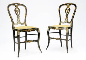 Pair of English ebonised hall chairs with ornate gilt & floral decoration, mid 19th century. Upholstery stained. Fair/Good condition