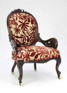English walnut ladies armchair. Beautifully pierced open work carving, tastefully upholstered in a foliate red & beige fabric. 19th Century patina. VG condition