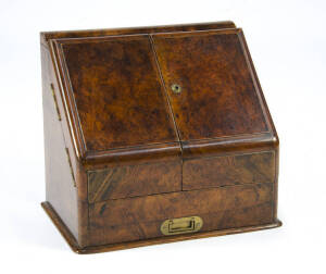 DESK COMPENDIUM: Antique burr walnut slope front box with 2 doors revealing compartments, ink pots & calender top. Original key and patina. Good condition