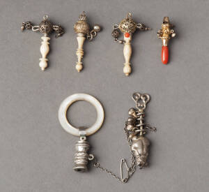 BABY RATTLES: Group of 6 miniature antique & vintage rattles. Noted; gilded example with coral handle. 3-6cm each