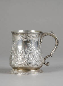 GEORGE II Sterling silver tankard. Bell shaped with foliate repousse work. Made by Bowyer Walker of London c1737 with later inscription "The Gift of George Bankes ESQre M.P, 1846." [British Politician]. Foot dented. Weight 340 grams. Fair/Good condition