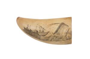 A scrimshaw whale's tooth with whaling scene. 10cm.