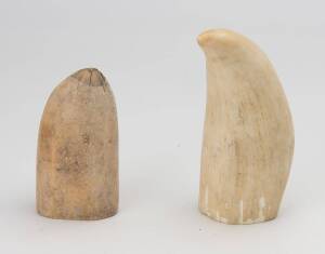 Two whale's teeth, 18/19th century. 10cm and 14cm.