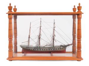 A model ship of "The Lady Nelson", in a huon pine and glass display cabinet, late 19th Century. 49cm high, 62cm wide, 30cm deep. 
