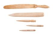 A group of 5 whalebone implements including bodkins (3), a paper knife and sailors tool. Longest 21cm