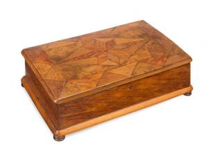 WILLIAM NORRIE New Zealand inlaid timber box, burr totara, mottled kauri, rewa rewa, puriri and maire, c1890. 10cm high, 30cm wide, 19cm deep