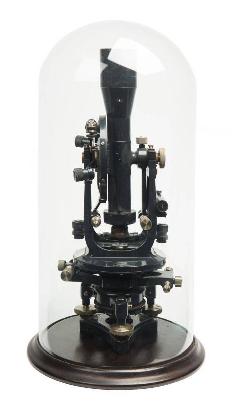 Theodolite by Stanley of London called "The Eltham" model housed in 19th Century glass dome. A precision instrument in excellent working condition. Together with a 14 foot telescopic staff plus a 100 foot standard steel tape measure by E.R.Watts of London