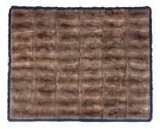 A possum skin rug on blue felt backing bearing label "Manufacturing Furriers, J.Jackson & Sons, Tivoli Fur Store, Albert Square, Brisbane", &nbsp;early&nbsp;20th Century. 184cm x 152cm. Provenance: The rug was originally commissioned by the vendors mother during th