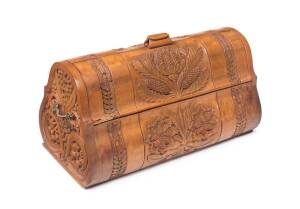 An Australian folk art sewing box carved with waratahs, wattle, banksia, Sturt desert pea, gum blossoms etc. Late 19th Century. 29cm high, 59cm wide, 30cm deep 