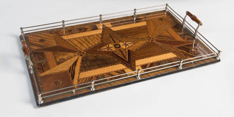 An Australian inlaid timber serving tray, Queensland origin with makers label "Thos. Griffith, Nth Tamborine", early 20th Century. 56 x 37cm