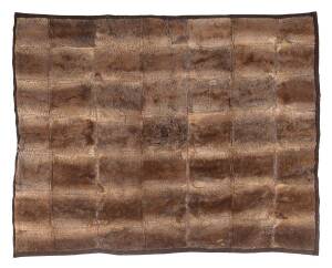 An Australian 49 pelt platypus skin rug. 132 x 155 cm"This rug was acquired by the vendor from John Bovill, now deceased, in 1997. The rug had been in Mr Bovill's family, residents of Tasmania, since the pelts were collected in the late 19th and early 20t