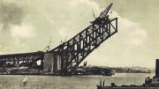 SYDNEY HARBOUR BRIDGE: 5 Large printers proofs depicting the building of the Sydney Harbour Bridge, plus 1 slightly smaller in presentation mount from Bloxham & Chambers with the photographer identified as E.Stewart McLean and the plate etched by Bacon &
