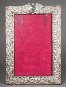 PHOTO FRAME: Of generous proportions with red silk backing. Made for Thos. Webb  & Sons of Melbourne by Synyer & Beddoes of Birmingham c1901. 37cm x24cm