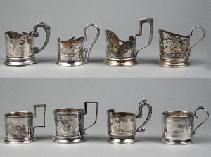 PODSTAKANNIK: Group of 8 assorted Russian silver tea glass holders. 820 grams total.