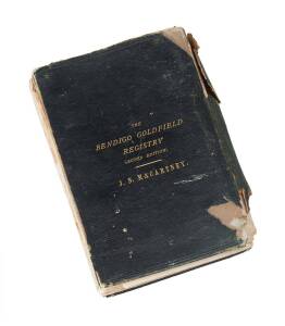 "The Bendigo Goldfield Registry" by J.N.Macartney 2nd edition, with interesting foldout maps and advertising. Cover and spine damaged but internally sound