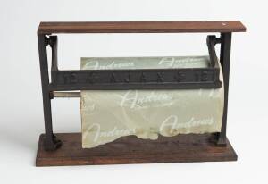 Ajax No.12 shop paper dispenser with original paper. 19th Century. 31cm high, 46cm wide, 13cm deep