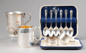 STERLING SILVER: Christening mugs (2); boxed set of 6 tea spoons; napkin rings (2); mustard spoon & jam spoon. 410 grams. Good condition