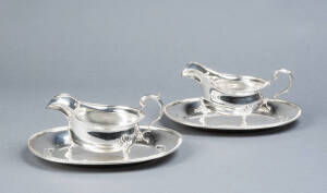 STERLING SILVER: Pair of English sauce boats with matching oval diahes. Made by Addie Bros. Ltd. of Birmingham c1951. Weight 910 grams. VG condition