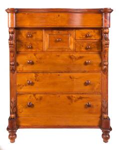 A huon pine eight drawer chest with serpentine front and carved corbels, Circa 1870 