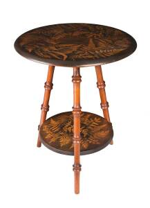 An Australian kauri pine spatter work cricket table, late 19th Century. 55cm high, 45cm diameter