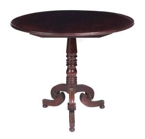 A rare Australian cedar tea table with tilt top, early 19th Century, very fine ring turned column and Regency style roundels to legs; 76cm high, 94cm diameter