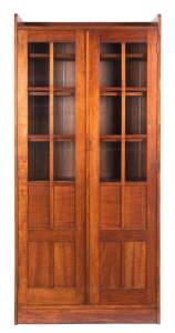 An Australian Arts and Crafts blackwood bookcase, cicra 1900; reputedly one of the original features from Buckley & Nunn department store; 192cm high, 92cm wide, 28cm deep.