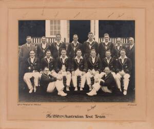 1930 AUSTRALIAN CRICKET TEAM, large official team photograph, taken by T. Bolland, titled "The 1930 (17th) Australian Test Team", signed to mount by the entire team, 17 signatures