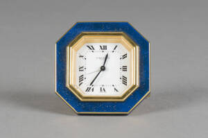 CARTIER CLOCK: Blue enamel & gold finished octagonal bedside clock. In original fiitted case. 7.5cm.