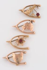 Four gold wishbone brooches, various makers, map of Australia, map of Tasmania, floral and Mother motifs. 9ct yellow and rose gold, and lined gold. Total Weight 6.68 grams.