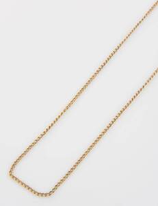 A gold guard or muff chain, open curblink design. 15ct yellow gold. Weight 17.96 grams. Length 134cm. Applied three part bar mark with unidentified makers mark.