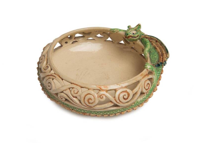 Marguerite Mahood (1901-1989) "Greedy Dragon" A glazed earthenware pierced dragon applied dish