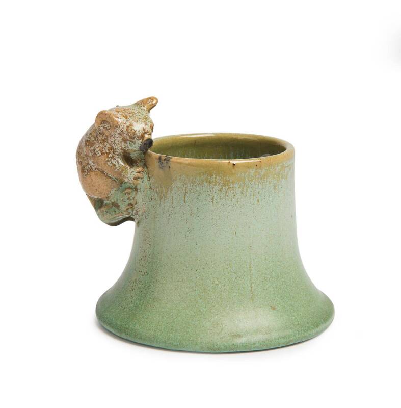 Remued Pottery A small glazed earthenware koala moulded vase