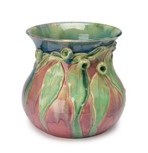 Margaret Kerr (1898-1958) A glazed earthenware gum leaf and gumnut moulded vase