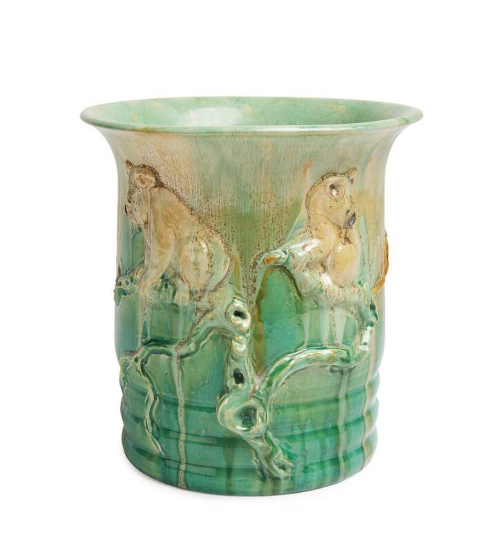 Remued Pottery A rare green glazed eartherware vase moulded with koalas