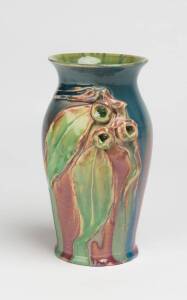 Remued Pottery A blue and pink glazed earthenware vase with applied gumnuts and gum leaves