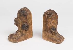 William Ricketts (1898-1993) A pair of glazed earthenware bookends relief moulded with Aboriginal children's faces