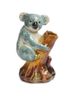 Grace Seccombe (1880-1956) "Billie Bluegum" c. 1945 A glazed earthenware figure of a crinkly eared Koala