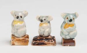 Grace Seccombe (1880-1956) Three miniature glazed earthenware koala figures