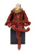 Marguerite Mahood (1901-1989)A rare hand modelled glazed earthenware devil puppet in a red velvet suit, circa 1930