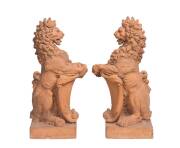 A pair of terracotta lion garden statues, circa 1870