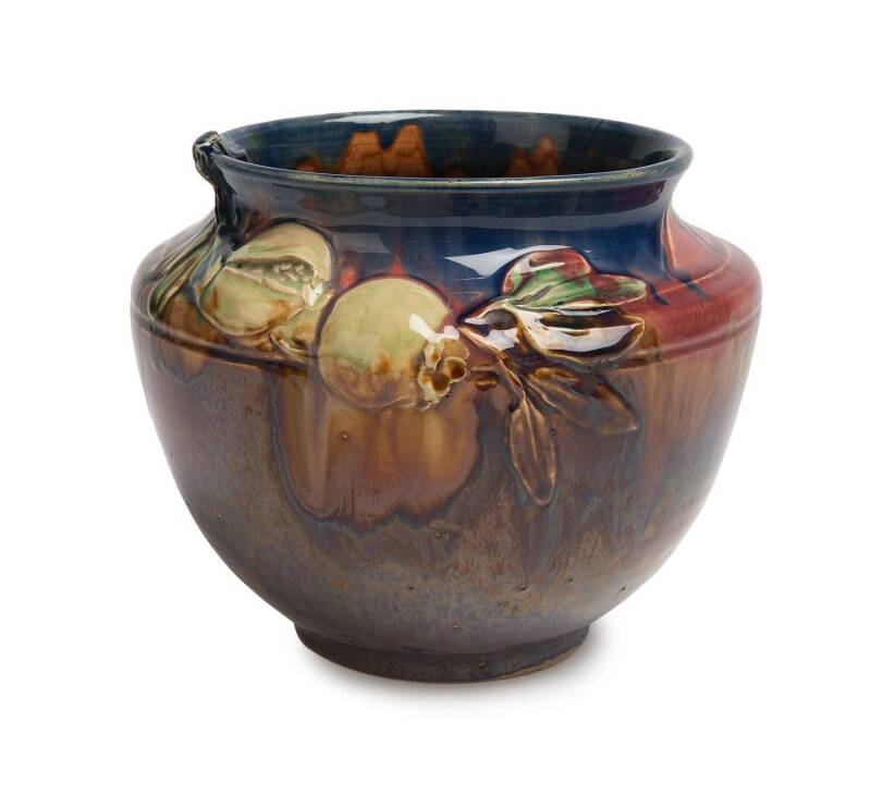 Alan James (act. circa 1932-1979) For Remued A wheel thrown glazed earthenware jardinière decorated with pomegranates and leaves