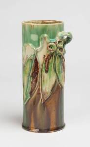 Remued Pottery A green glazed earthenware vase with applied gumnuts and gum leaves