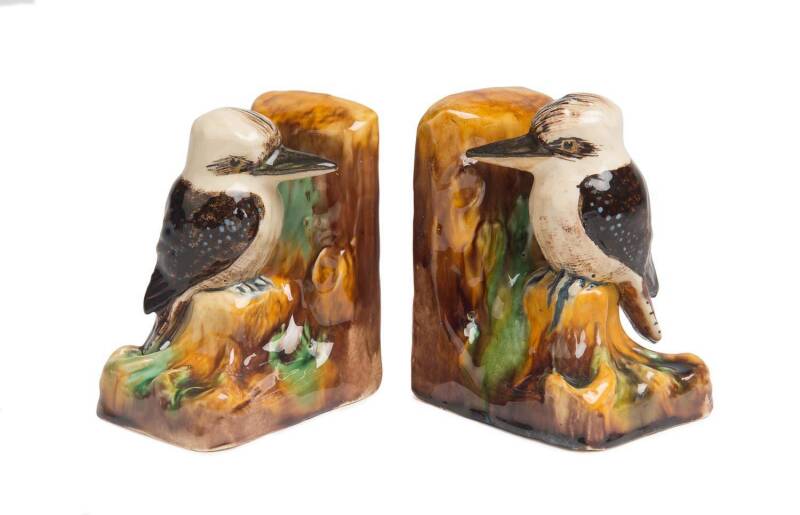 Grace Seccombe (1880-1956) A pair of glazed earthenware kookaburra bookends