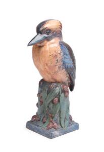 Maude O'Reilly (1886-1971) A slip cast, hand-finished, glazed earthenware figure of kookaburra with gumnuts and leaves, 1926