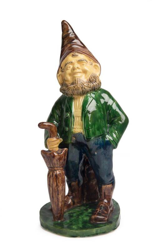 Bosley A glazed earthenware figure of a garden gnome with an umbrella