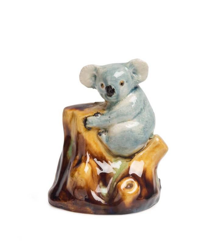 Grace Seccombe (1880-1956) A glazed earthenware figure of a koala