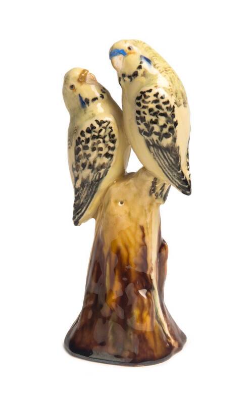 Grace Seccombe (1880-1956) A glazed earthenware figure of two yellow budgerigars