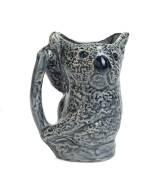 William Merric (Merric) Boyd (1888-1959) A blue glazed eathenware jug modelled as a koala