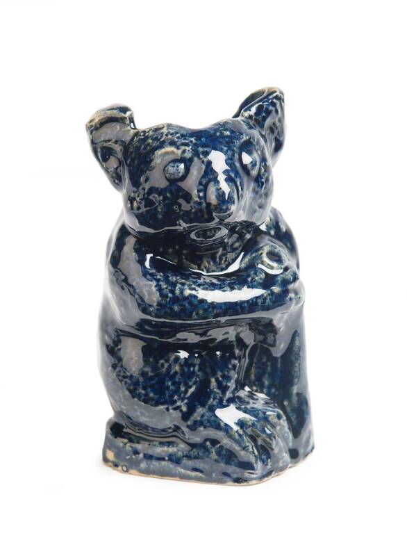 William Merric (Merric) Boyd (1888-1959) An early blue glazed earthenware koala vase