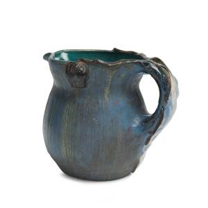 Philippa James (1893-1967) A glazed earthenware gum leaf and gumnut decorated jug